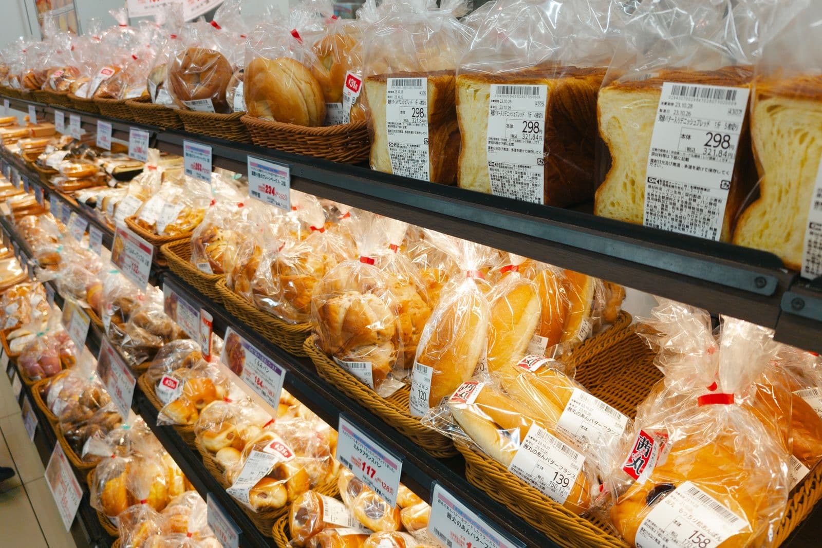 Shelves of fresh loaves and buns