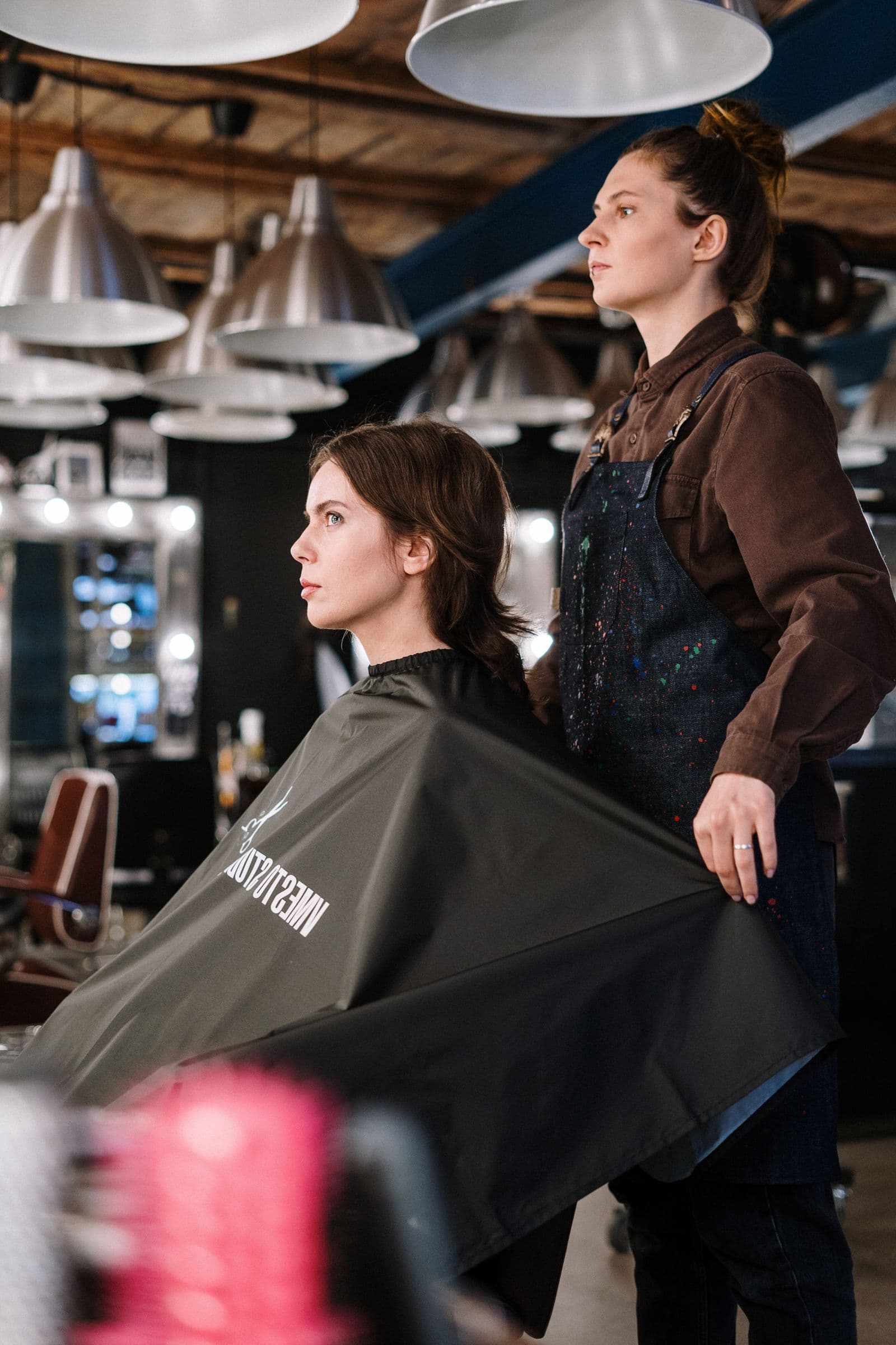 A stylist at work in warm evening light
